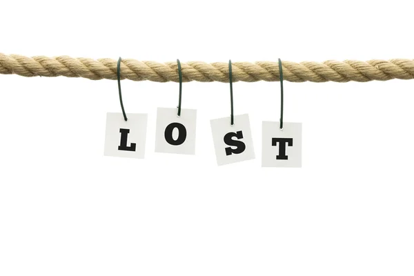 Word - Lost - hanging from a rope over white — Stock Photo, Image