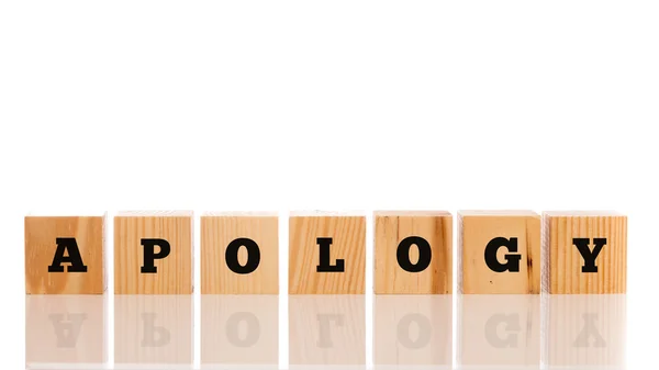 The word Apology on seven wooden cubes — Stock Photo, Image