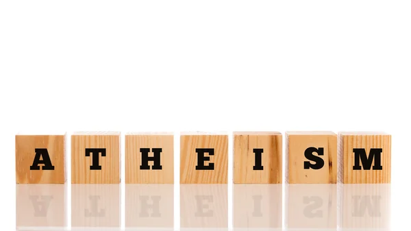 Row of wooden blocks spelling - Atheism — Stock Photo, Image