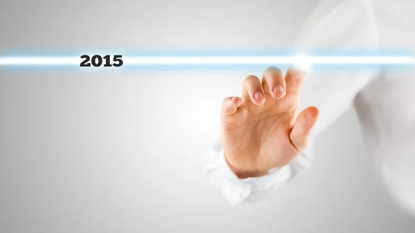 Hand Touching Screen with Highlighted 2015 — Stock Photo, Image