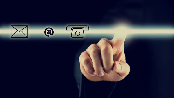 Man activating a bar with contact icons — Stock Photo, Image