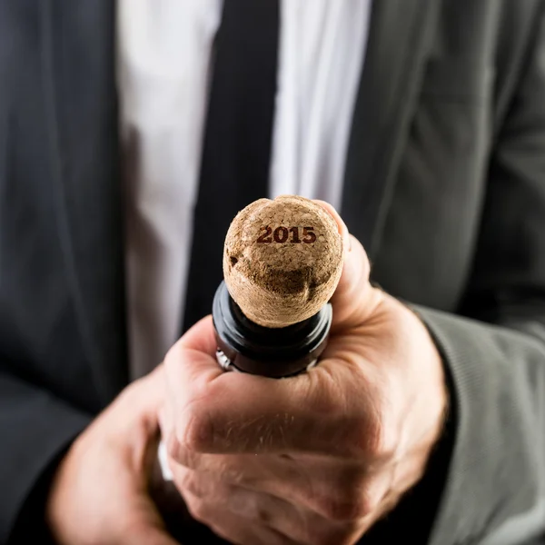 Businessman Opening Wine Bottle with Cork — Stock Photo, Image