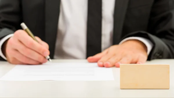 Small Piece of Blank Wood in Front Businessman — Stock Photo, Image