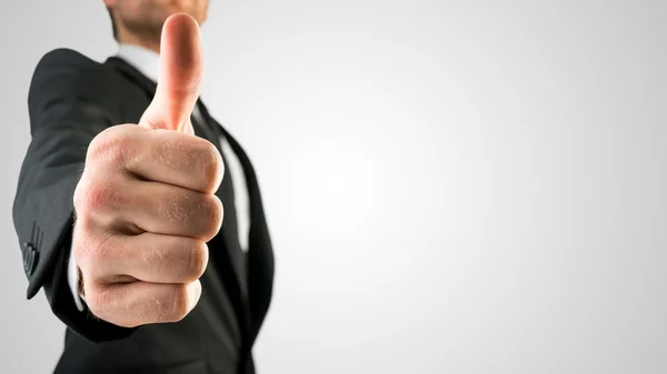 Businessman Showing Thumbs Up Sign in Close Up — Stock Photo, Image