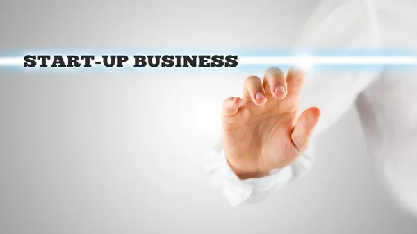 Finger Highlighting Startup Business Words — Stock Photo, Image