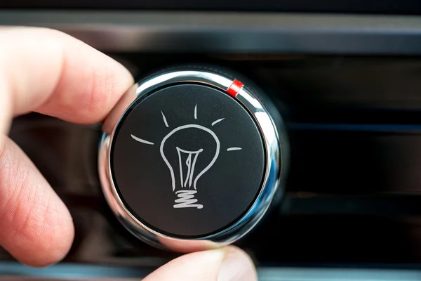 Button with a hand-drawn illuminated light bulb — Stock Photo, Image