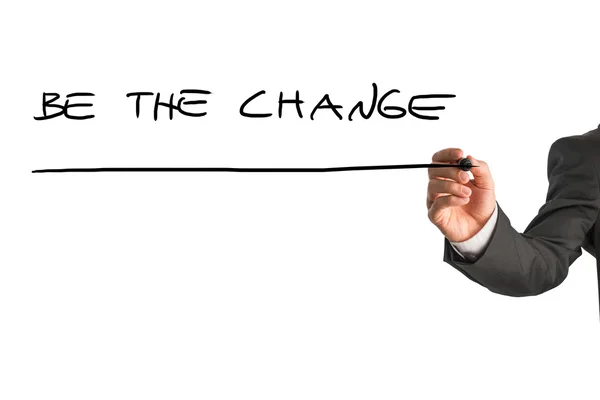 Businessman writing Be the change — Stock Photo, Image