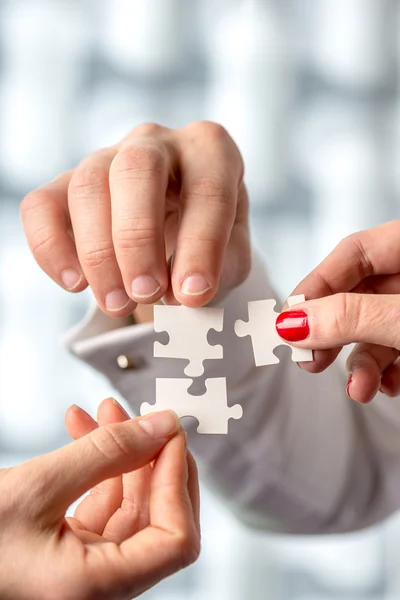 Conceptual Human Hand Holding Puzzle Pieces — Stock Photo, Image