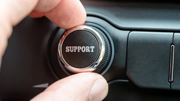 Man turning a dial with the word Support — Stock Photo, Image