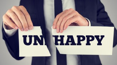 Kavramsal işadamı harap Unhap bir beyaz kağıt kapatın