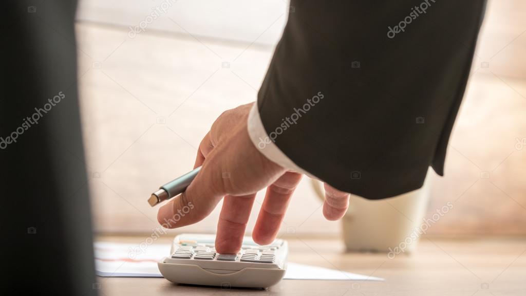 Businessman or accountant doing important financial calculation