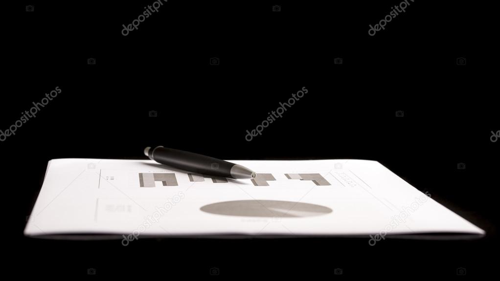 Business Document with Pen Isolated on Black