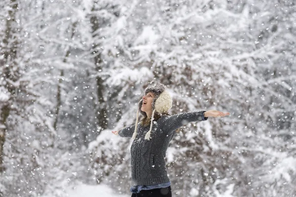 Happy young woman embracing beautiful life with her arms wide op — 图库照片