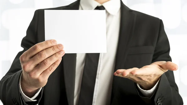 Businessman Holding White Card with Copy Space — Stock fotografie