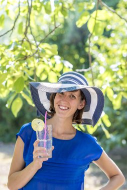 Happy attractive woman on a summer vacation
