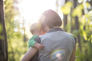 Young mother enjoying a beautiful moment of love, tenderness and
