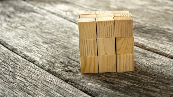 Cubo montado a partir de 27 pequeños cubos de madera —  Fotos de Stock