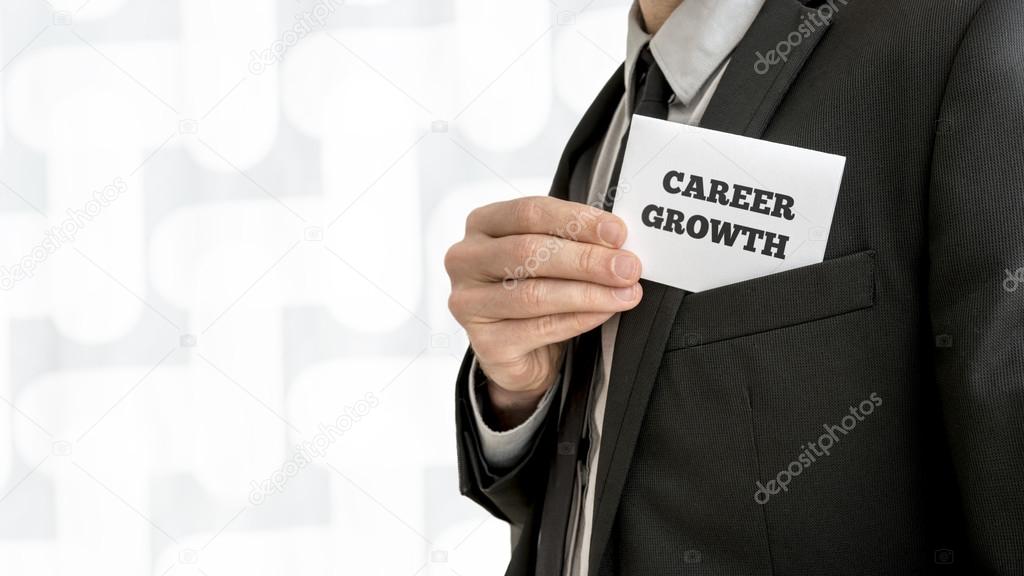 Closeup of career adviser taking his business card out of a jack