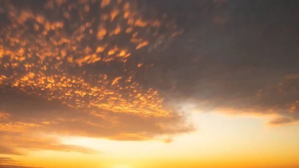 Evening sky with dramatic clouds over the sea. Dramatic sunset over the sea.wave clouds.