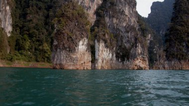 Coastal And Oceanic Landforms. Water Resources. Watercourse. Geological Phenomenon. Nature Reserve. Island. Rocks off the coast of the ocean. Coastal And Oceanic Landforms. Water Resources. Watercourse. Guadalest reservoir on a sunny summer morning