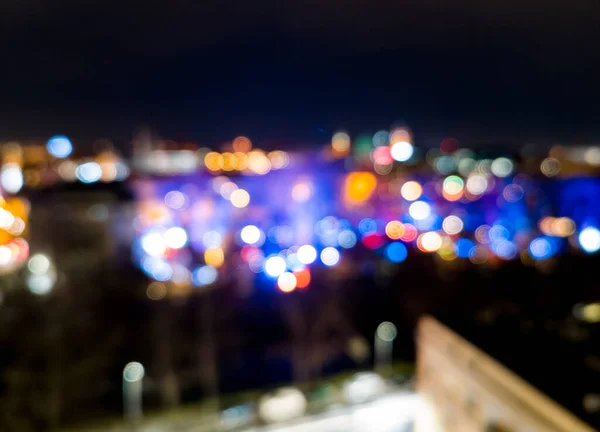 夜の色とりどりのボケの街の灯りを背景に — ストック写真