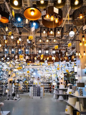 Wroclaw, Poland - June 6 2020: Interior of hall full of lamps and lights in home accessories shop clipart