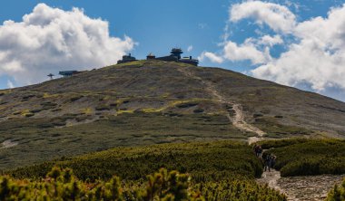 Giant Mountains, Poland - June 23 2020: Long mountain trail to peak of Sniezka the highest point of Giant Mountains clipart