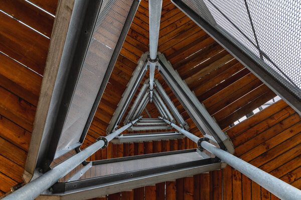 Walbrzych Mountains, Poland - July 7 2020: Tower on top of Trojgarb mountain at cloudy day