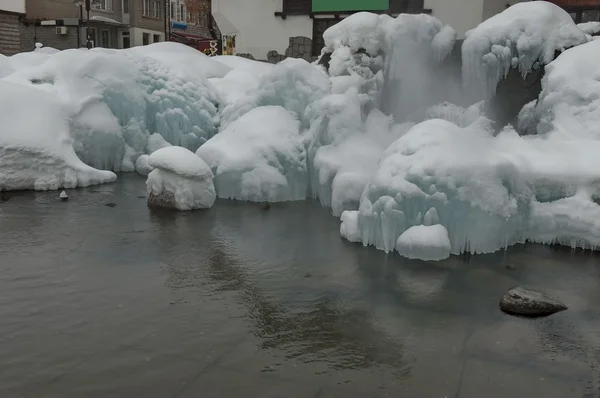 Frozen fountain with warm water in Bansko town — Stock Photo, Image