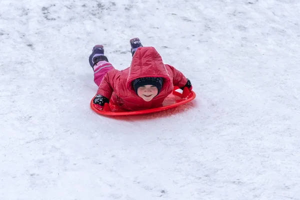 Little Girl Rides Sled Winter Slide Winter Holidays — Stock Photo, Image