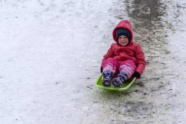 Little Girl Rides Sled Winter Slide Winter Holidays — Stock Photo, Image