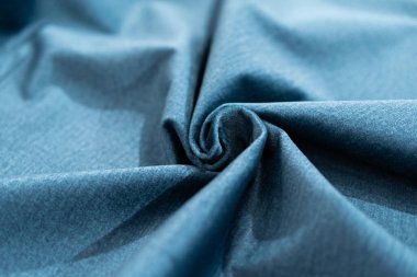 Lüks mavi kumaş örneği yakın plan. Arka plan olarak kullanılabilir. Sektör arkaplanı.