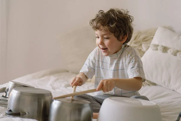 Cute Young Boy Using Wooden Sticks Bang Saucepans Set Drumset — Stock Photo, Image