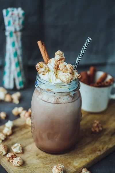 Caramel Popcorn Cacao with Whipped Cream. Unhealthy food — Stock Photo, Image
