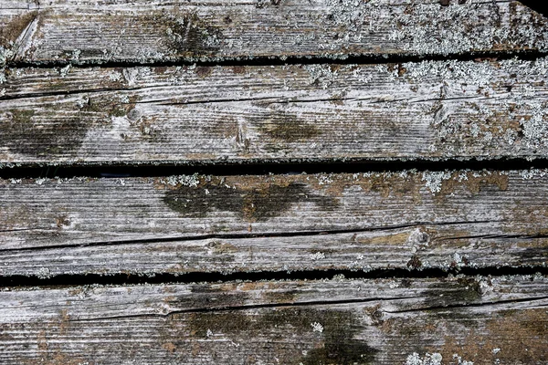 Antiguo puente de madera dañado fondo — Foto de Stock