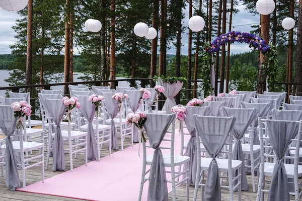 Arch for the Wedding Ceremony, Decorated with Cloth Flowers and