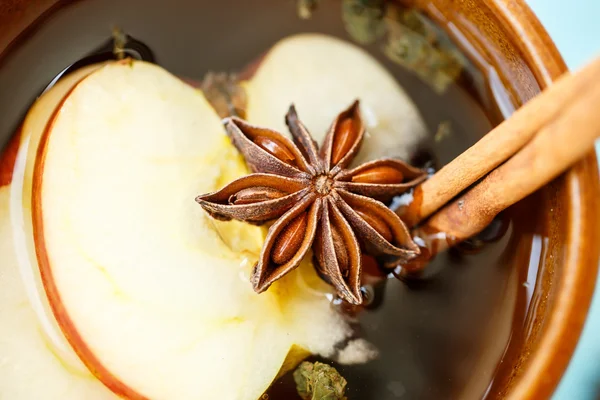 Apple tea with spices in a cup — Stock Photo, Image