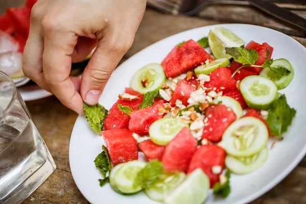 Watermelon salad with cucumbers — Stock Photo, Image