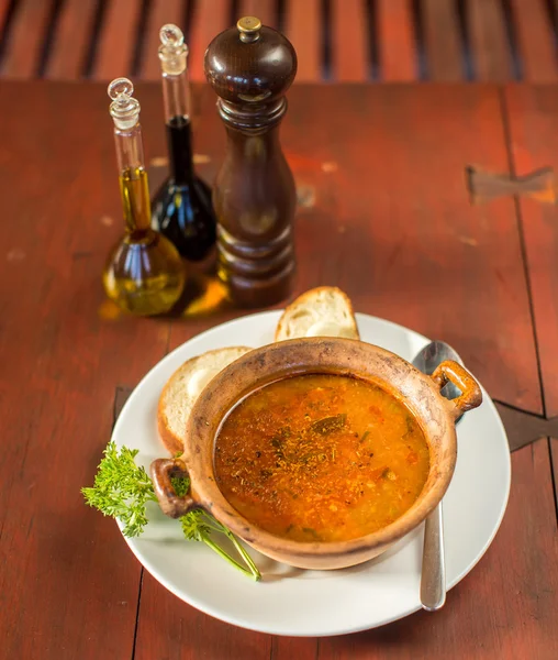 Fish soup with bread and garlic — Stock Photo, Image