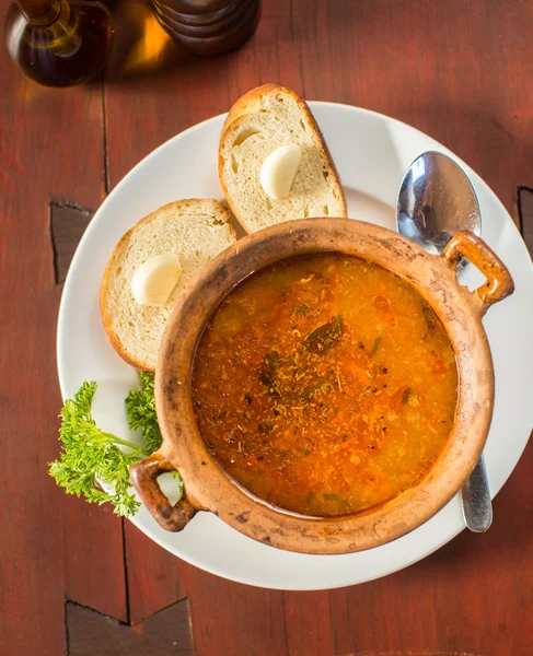 Fish soup with bread and garlic — Stock Photo, Image