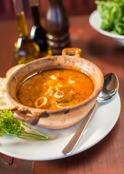 Fish soup with bread and garlic — Stock Photo, Image