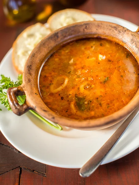 Fish soup with bread and garlic — Stock Photo, Image