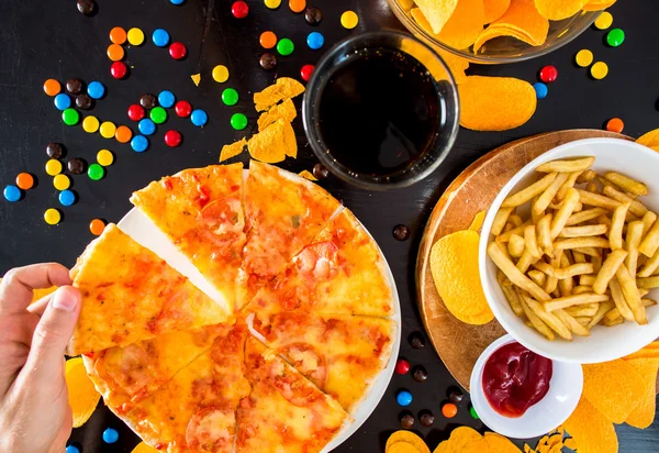 Fast food and unhealthy eating concept - close up of pizza,, fre — Stock Photo, Image