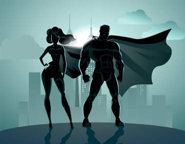 Süper kahraman çift: önünde poz o erkek ve kadın süper kahramanlar,