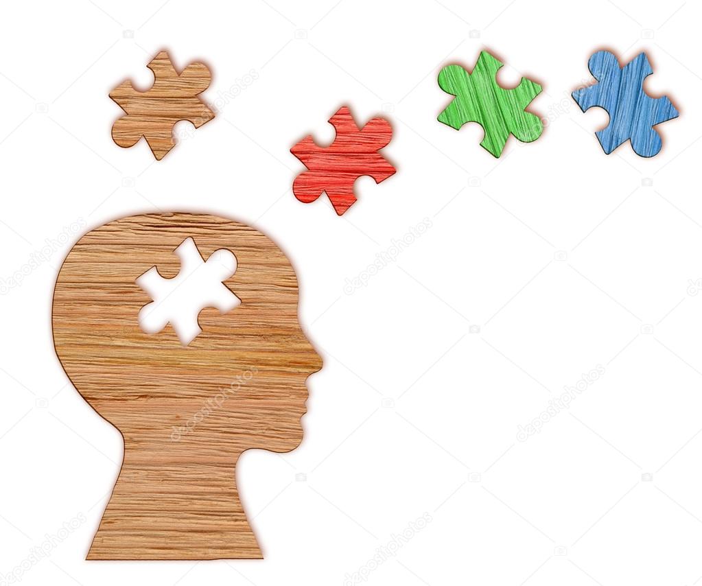 Human head silhouette, mental health symbol. Puzzle.