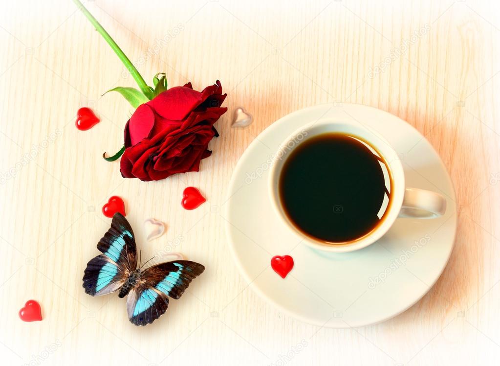 cup of coffee, butterfly and roses for Valentine's Day