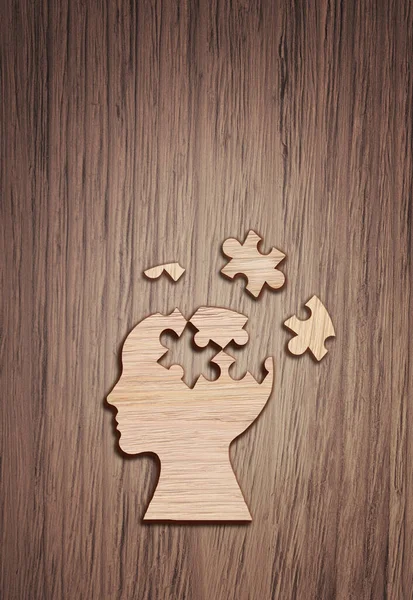 Human Head Silhouette Jigsaw Piece Cut Out Wooden Background Mental — Stock Photo, Image