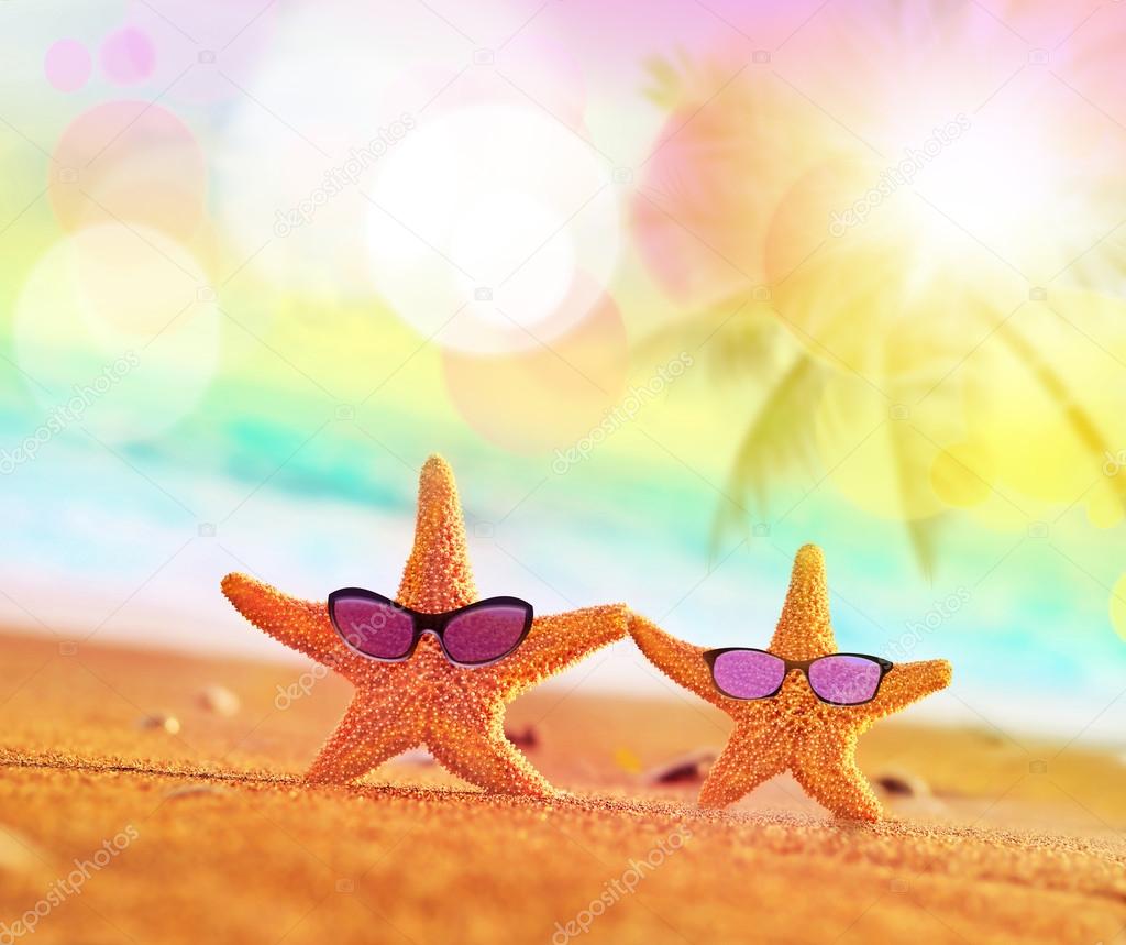 Summer beach. starfish in sunglasses 