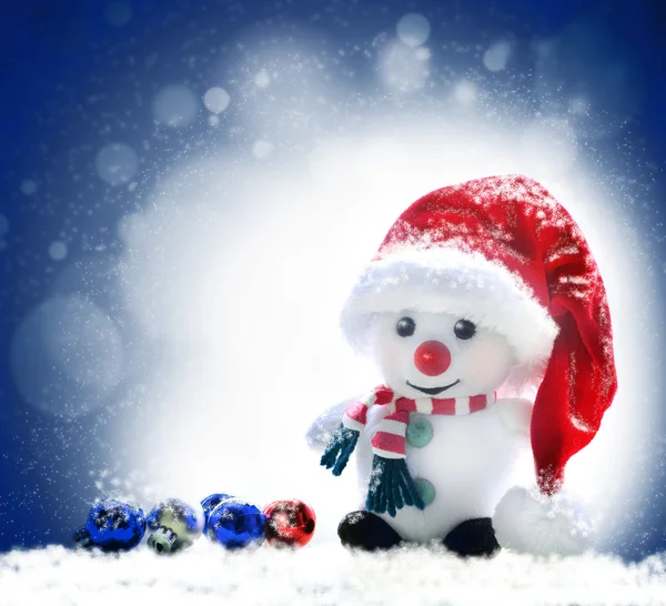 Snowman on blue sky background — Stock Photo, Image