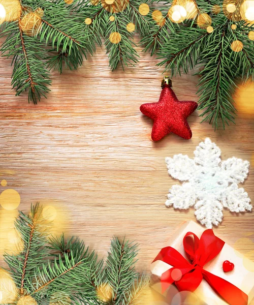 Christmas background. Pine and red star. Stock Picture